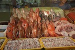 Buying Fish at Sea Side Market